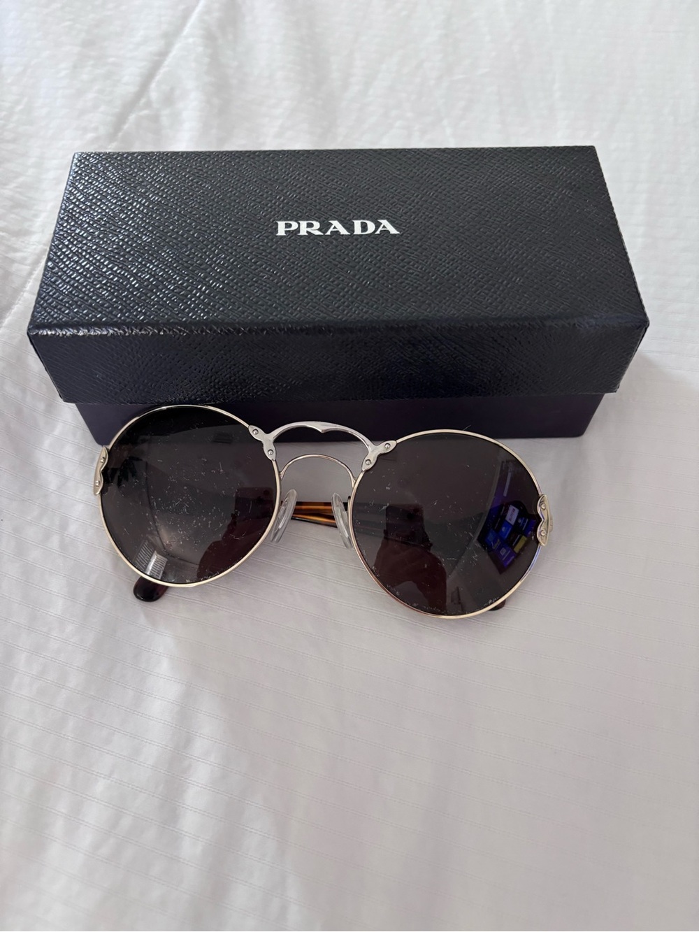 Prada Round Metal Frame Sunglasses in Silver with Dark Lenses